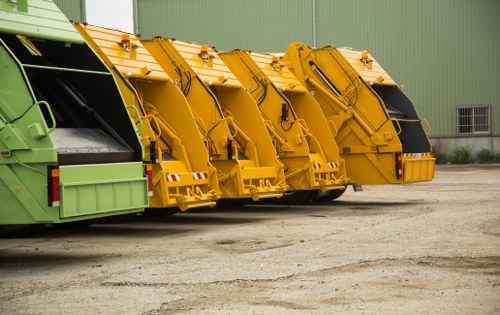 Close-up of garden debris and recycling bins used during clearance